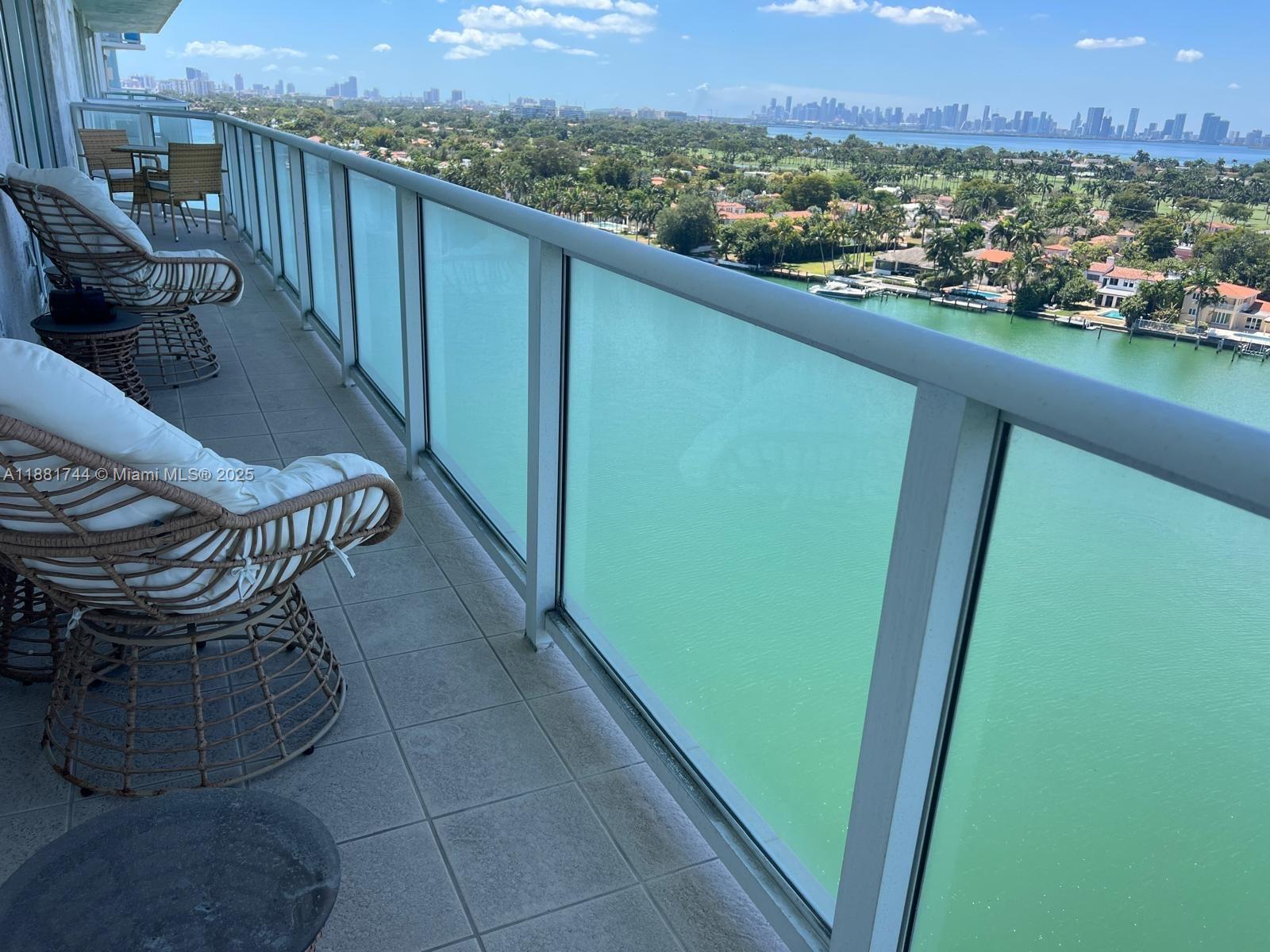 5900 Collins Avenue, Unit 1505 Miami Beach, FL 33140 - Photo 9 of 18 a view of balcony with furniture