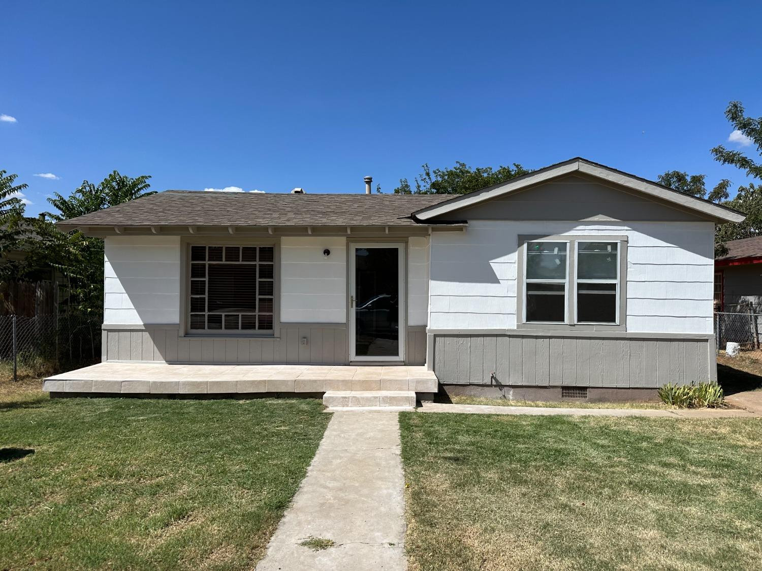 1110 46th Street Lubbock, TX 79412 - Photo 12 of 12 a front view of a house with garden