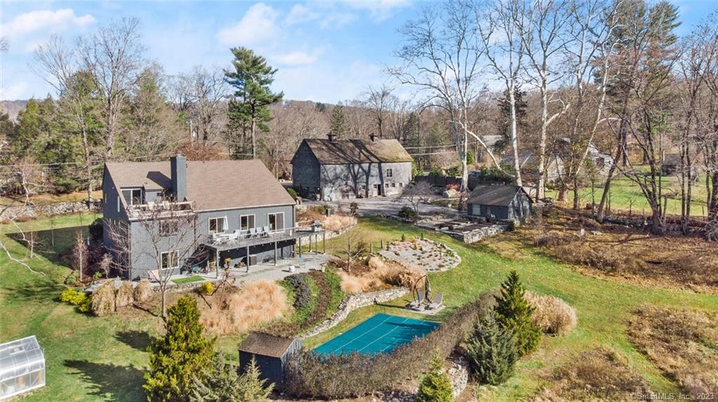 635 North Salem Road Ridgefield, CT 06877 - Photo 1 of 1 a view of a house with a yard and sitting area