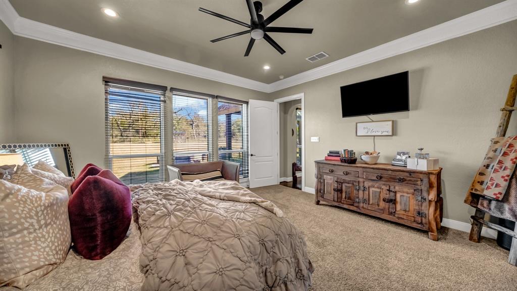 1600 Logans Run Road Perrin, TX 76486 - Photo 14 of 40 a living room with furniture and a flat screen tv