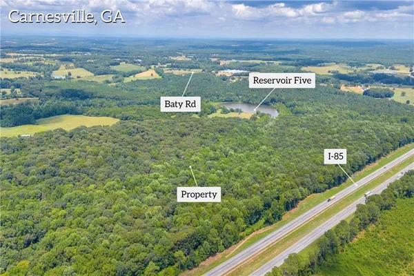 a view of a sign board with ocean view