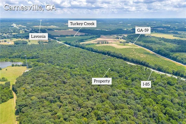 a view of a street with a building in the background