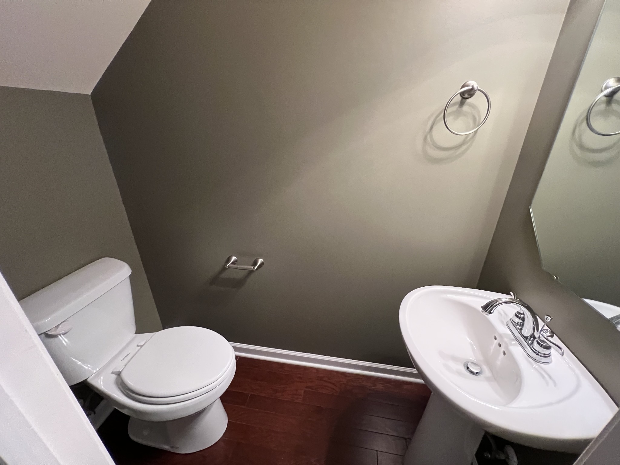 4145 Sunday Silence Way Murfreesboro, TN 37128 - Photo 12 of 13 a white toilet sitting next to a bathroom sink