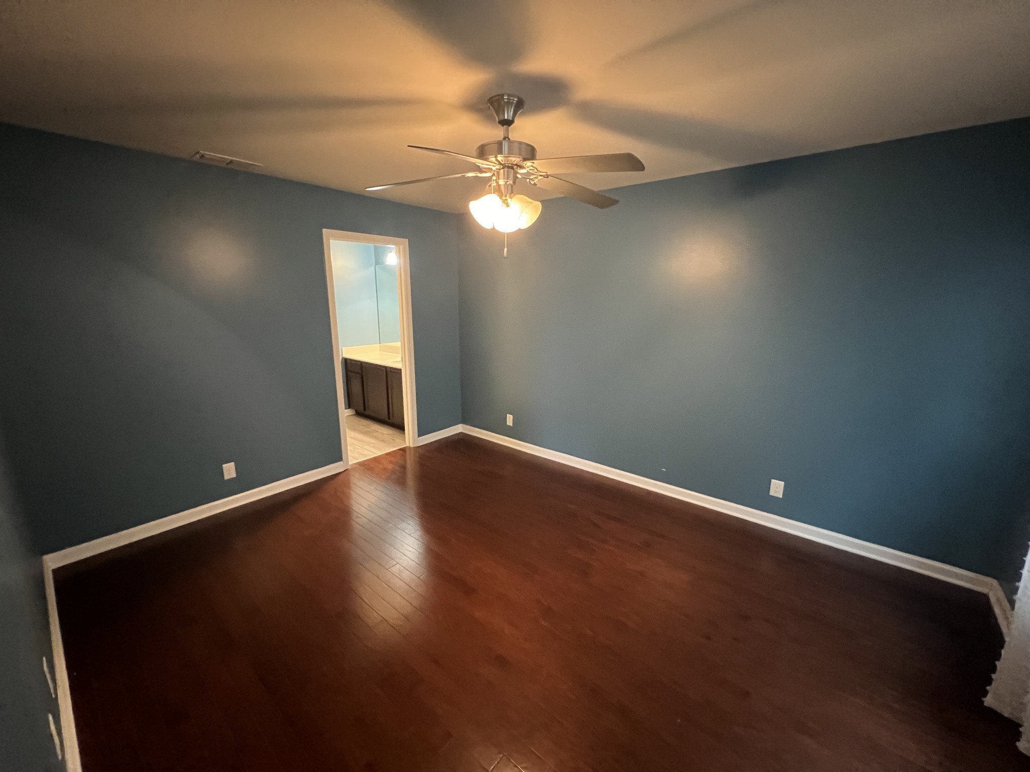 4145 Sunday Silence Way Murfreesboro, TN 37128 - Photo 5 of 13 a view of an empty room with window and wooden floor