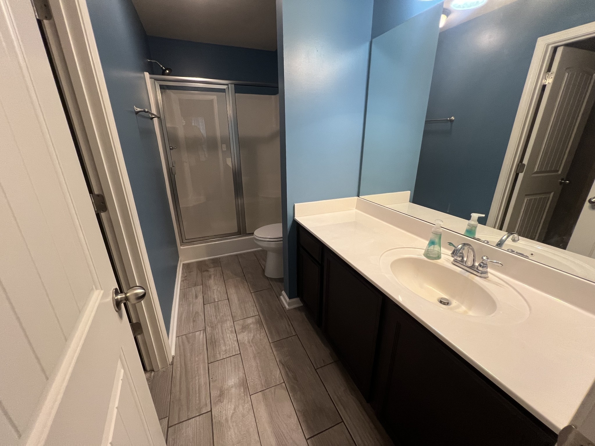 4145 Sunday Silence Way Murfreesboro, TN 37128 - Photo 6 of 13 a bathroom with double vanity and a mirror