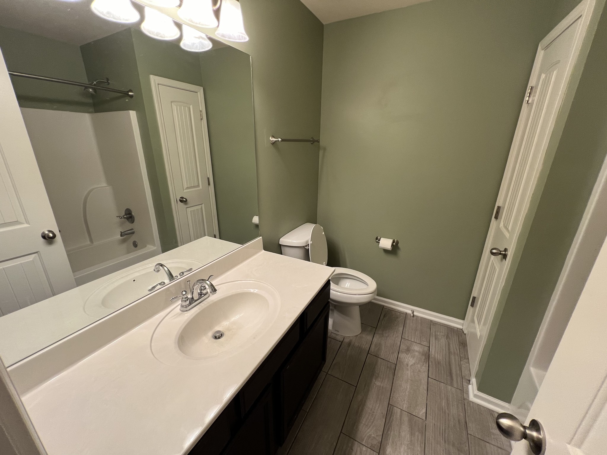 4145 Sunday Silence Way Murfreesboro, TN 37128 - Photo 10 of 13 a bathroom with a sink and mirror with toilet
