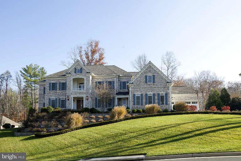 903 Georgetown Ridge Court McLean, VA 22102 - Photo 1 of 29 a front view of a house with a yard