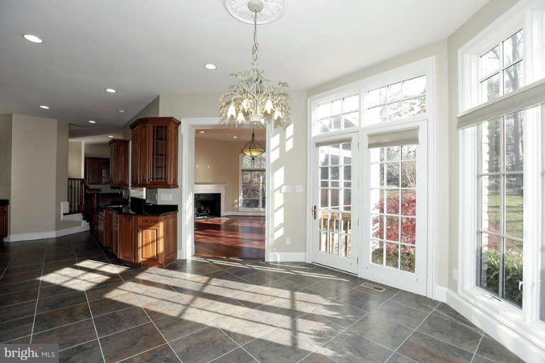 903 Georgetown Ridge Court McLean, VA 22102 - Photo 13 of 29 a lobby with furniture and a chandelier