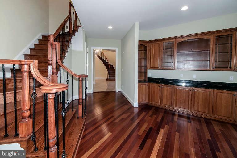 903 Georgetown Ridge Court McLean, VA 22102 - Photo 15 of 29 a view of entryway with wooden floor and stairs