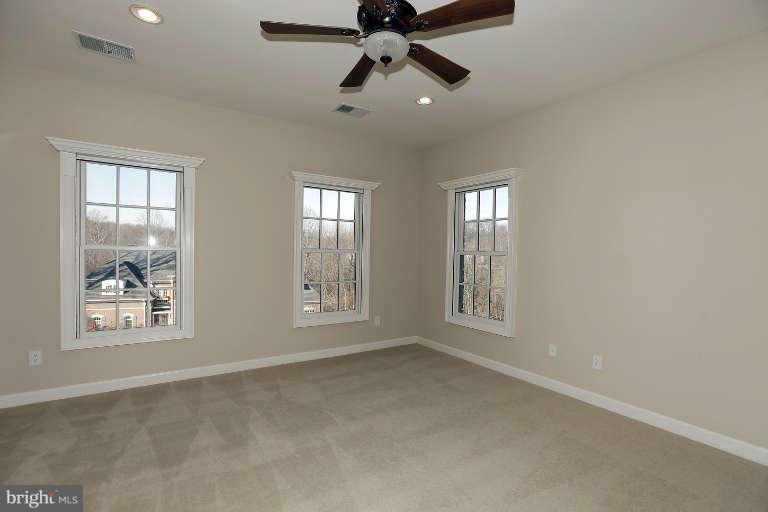 903 Georgetown Ridge Court McLean, VA 22102 - Photo 20 of 29 a view of an empty room with a window
