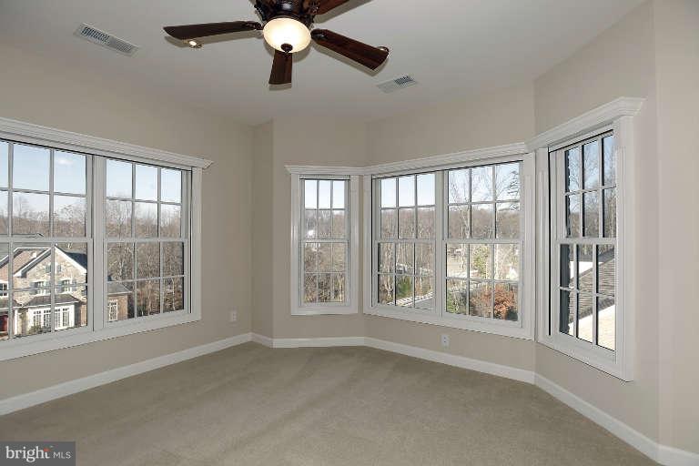 903 Georgetown Ridge Court McLean, VA 22102 - Photo 21 of 29 a view of an empty room with a window