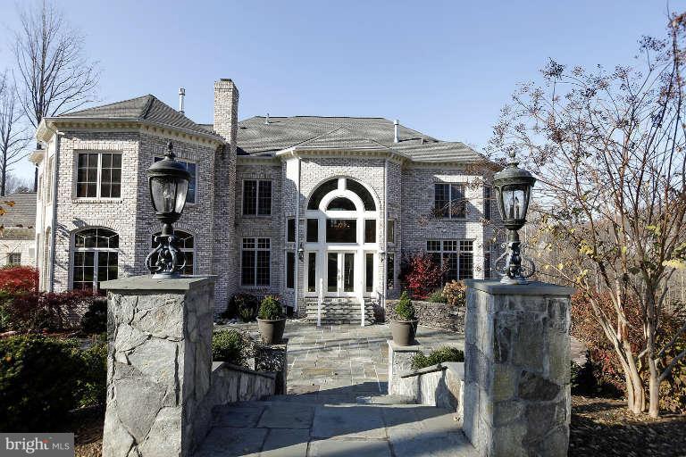 903 Georgetown Ridge Court McLean, VA 22102 - Photo 26 of 29 a front view of a house with balcony