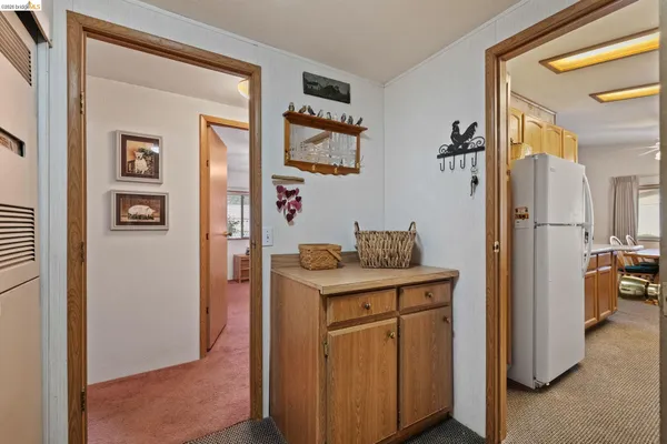 a view of a kitchen and utility room