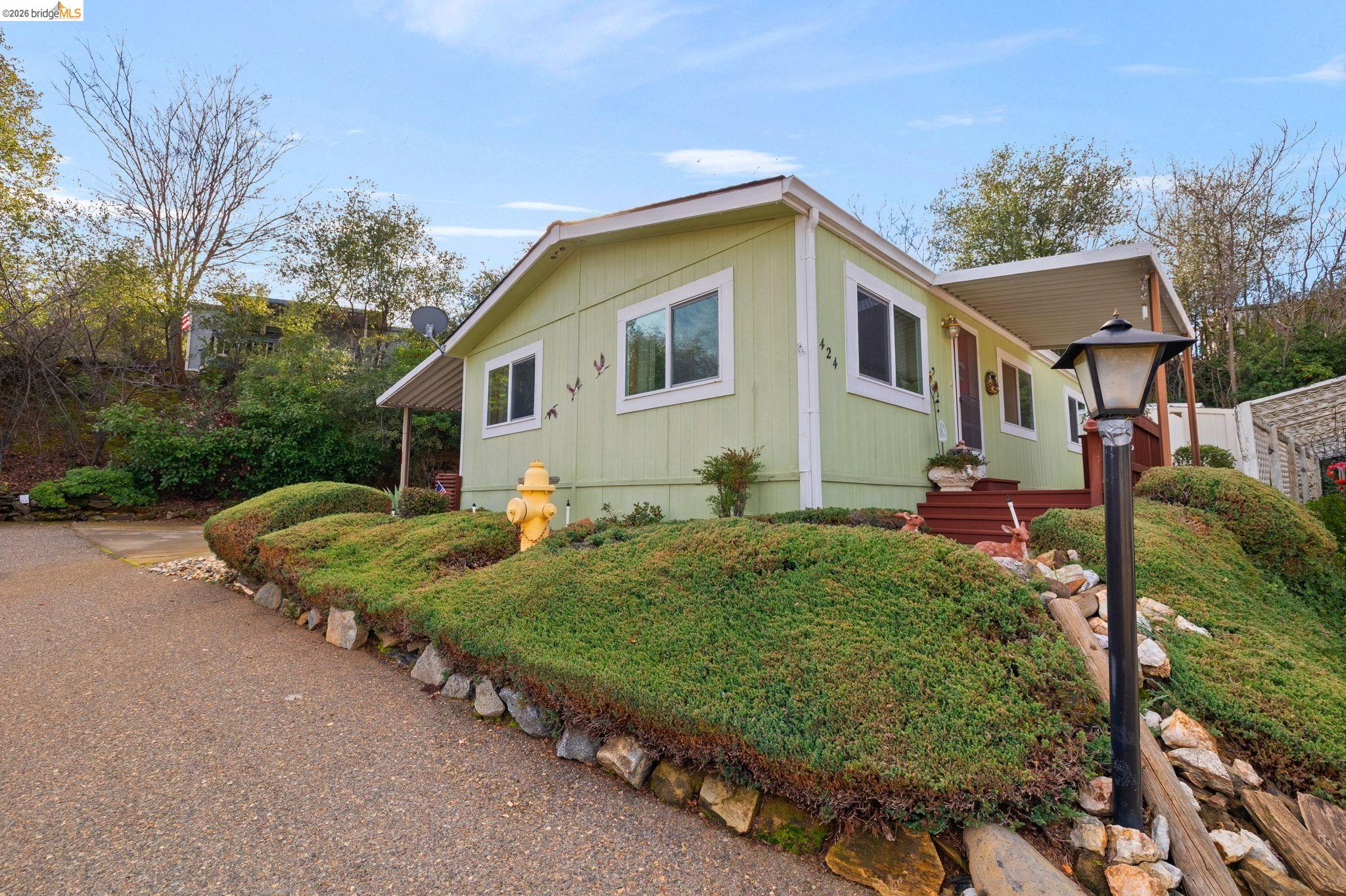18717 Mill Villa Road, Unit 424 Jamestown, CA 95327 - Photo 29 of 29 a view of a house with backyard and garden