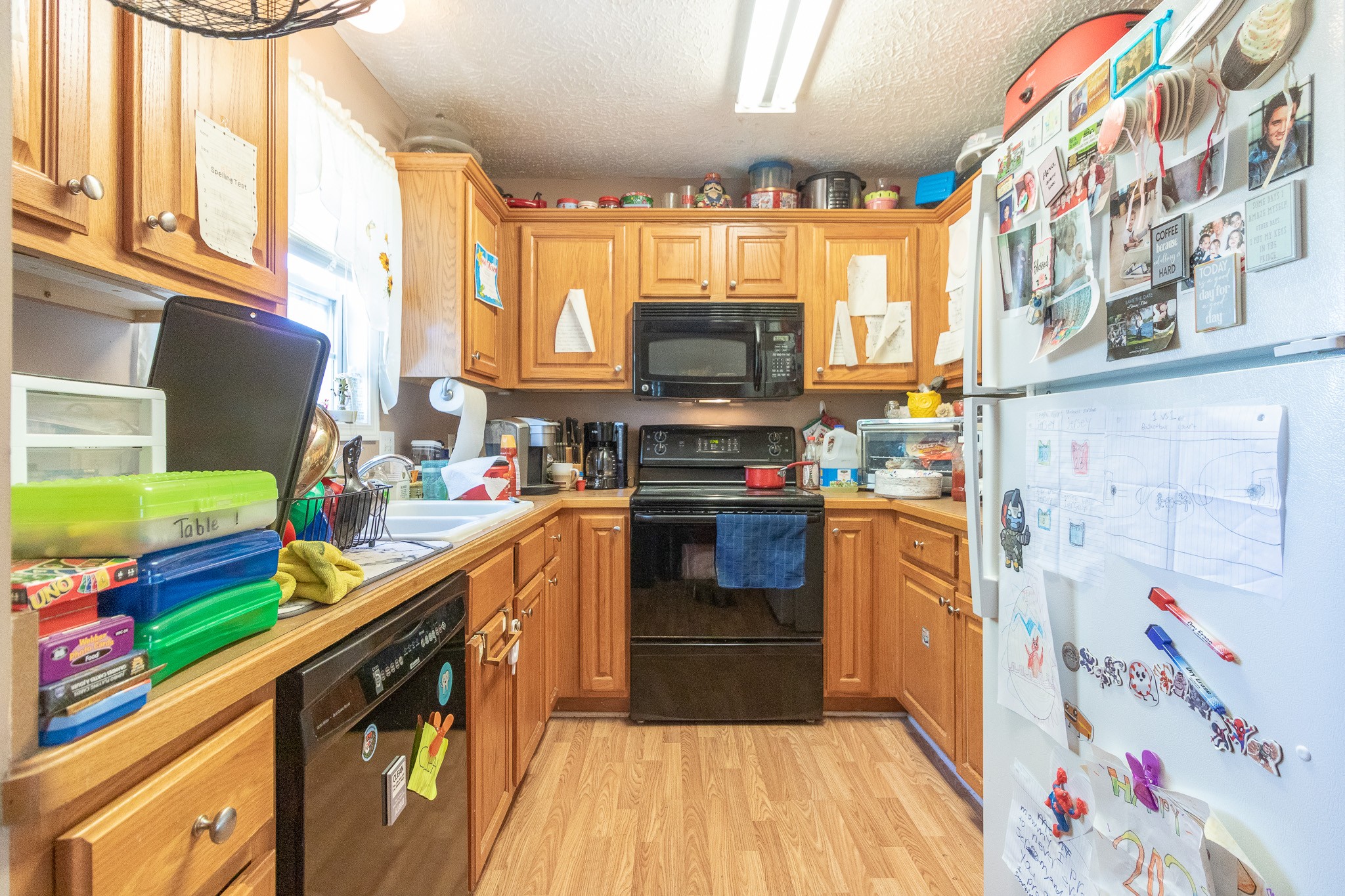 479 Berry Circle Springfield, TN 37172 - Photo 7 of 27 a kitchen with stainless steel appliances a sink and a stove