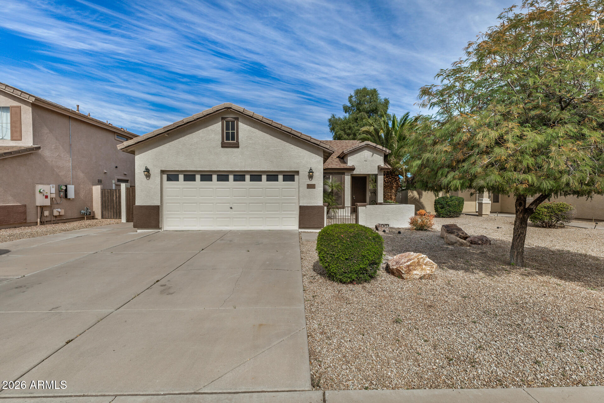 4314 East Megan Street Gilbert, AZ 85295 - Photo 1 of 31 a view of a house with a yard