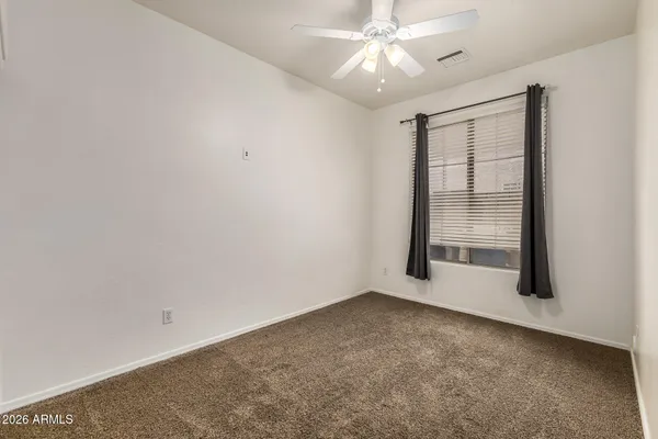 a kitchen with stainless steel appliances granite countertop a refrigerator a sink a stove a microwave and island