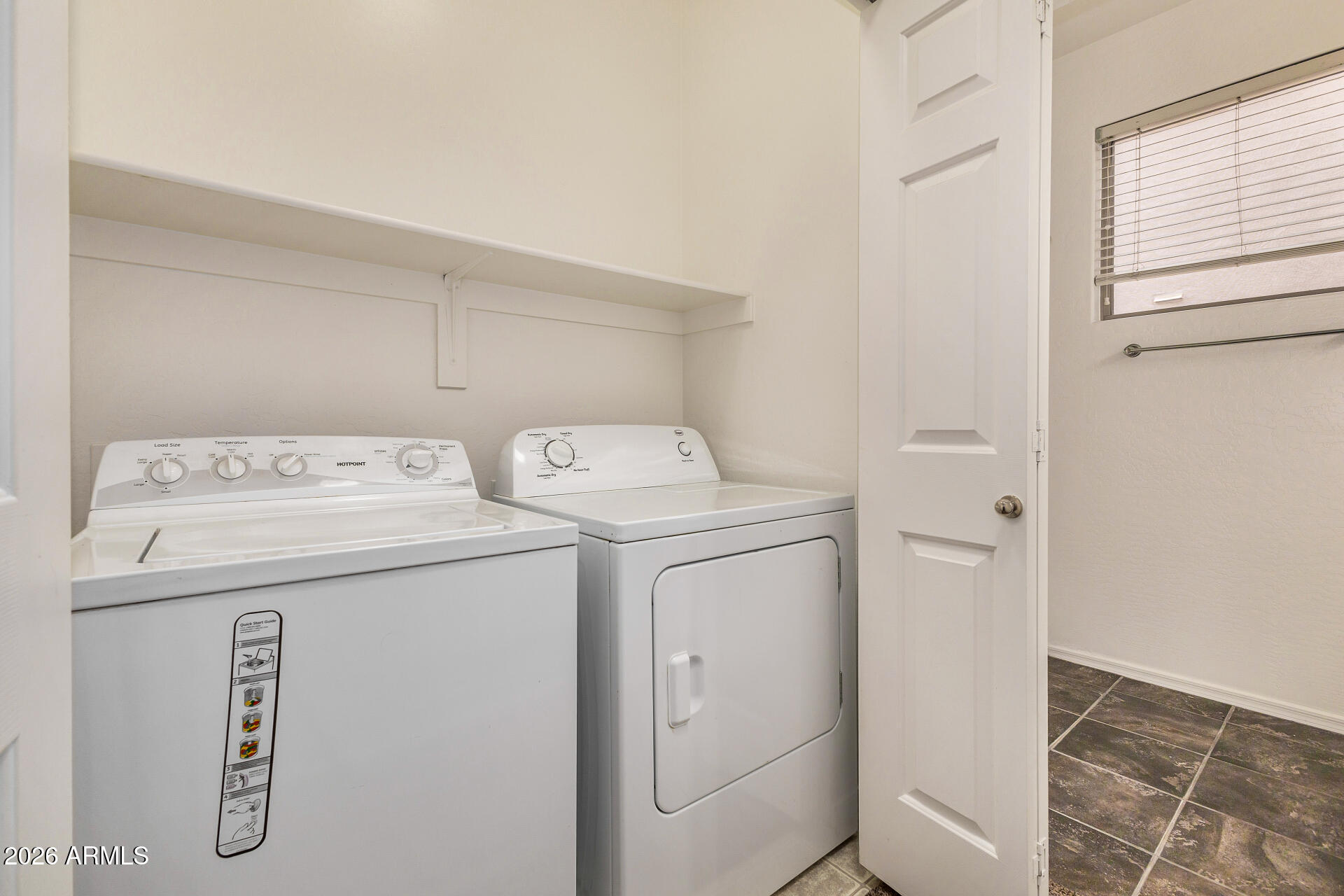 4314 East Megan Street Gilbert, AZ 85295 - Photo 26 of 31 a utility room with dryer and washer