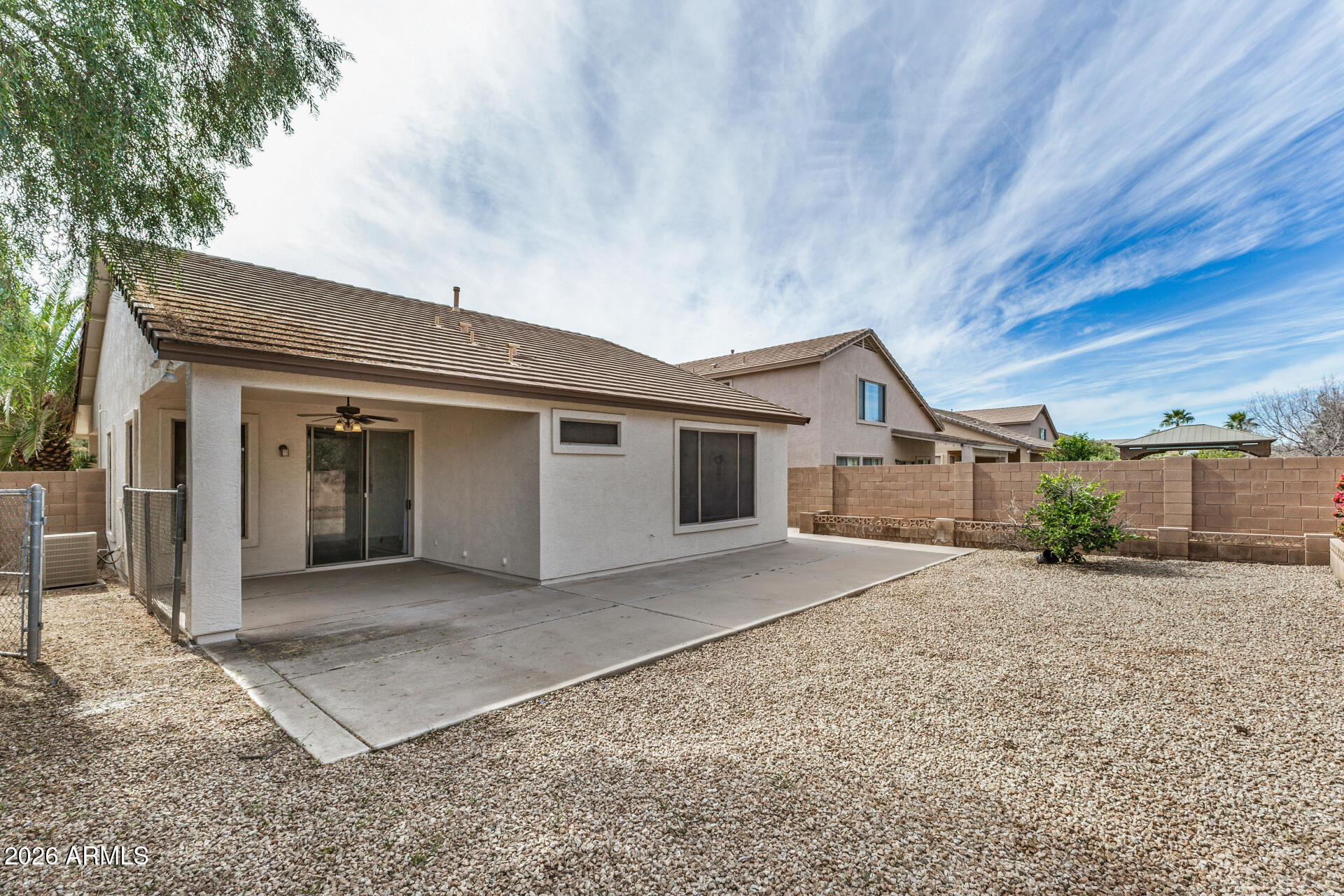 4314 East Megan Street Gilbert, AZ 85295 - Photo 7 of 31 a view of a house with a patio