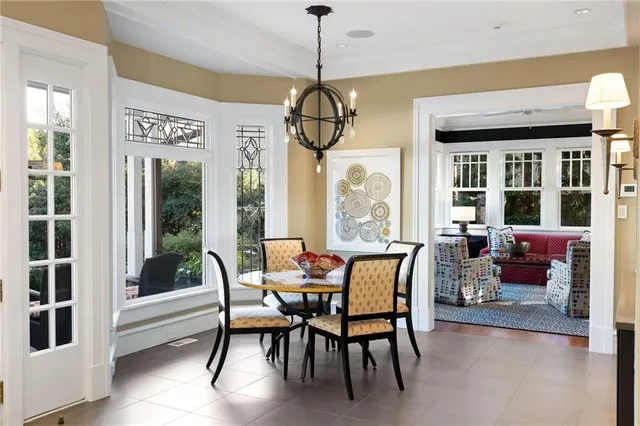 a dining room with furniture window wooden floor