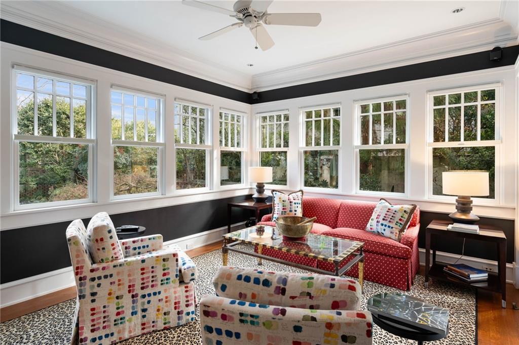 81 Peachtree Circle Northeast Atlanta, GA 30309 - Photo 18 of 54 a living room with furniture and a large window