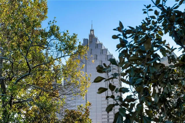 a large white kitchen with a large window