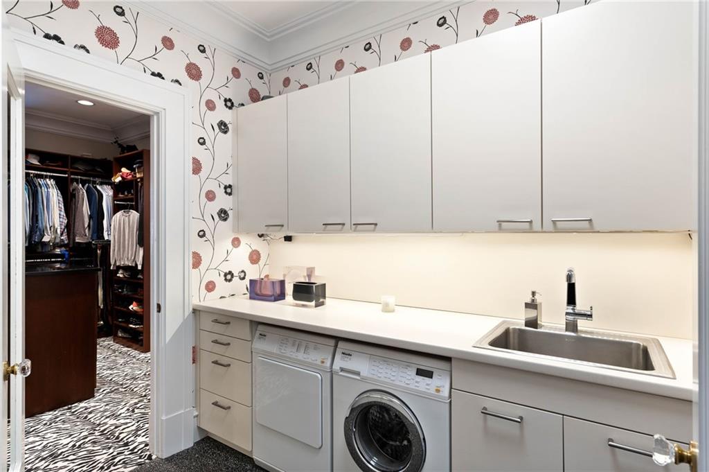 81 Peachtree Circle Northeast Atlanta, GA 30309 - Photo 29 of 54 a kitchen with a sink and cabinets