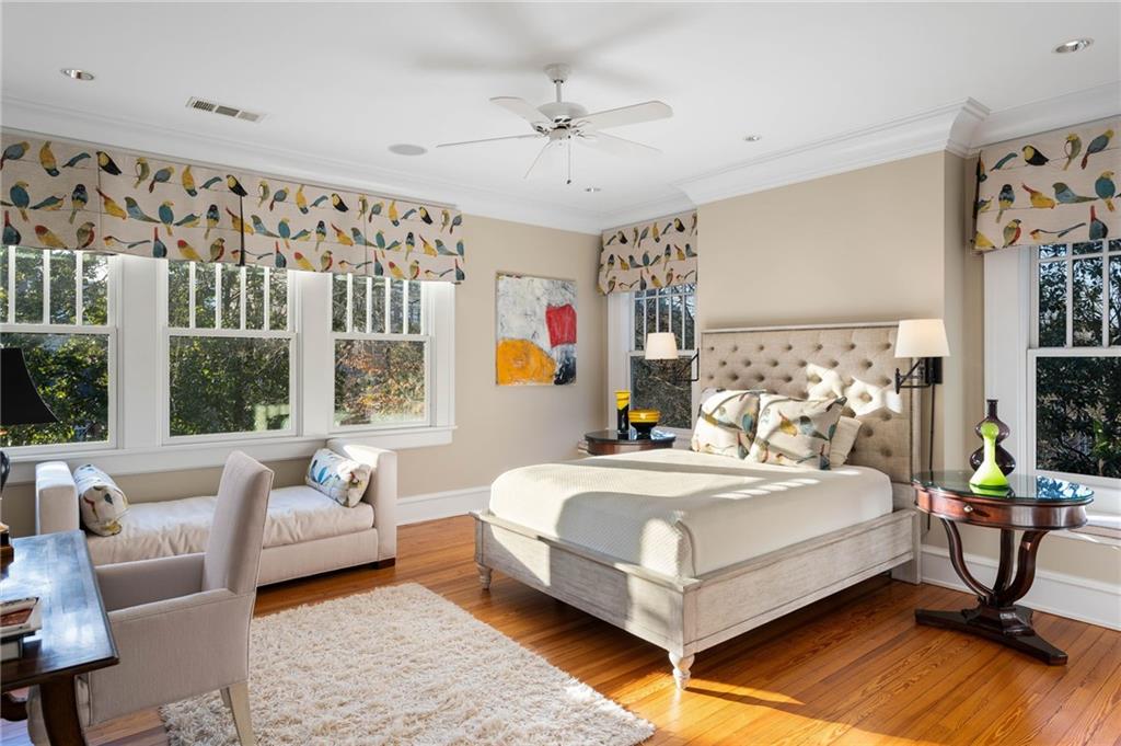 81 Peachtree Circle Northeast Atlanta, GA 30309 - Photo 32 of 54 a bedroom with a bed couch and a window