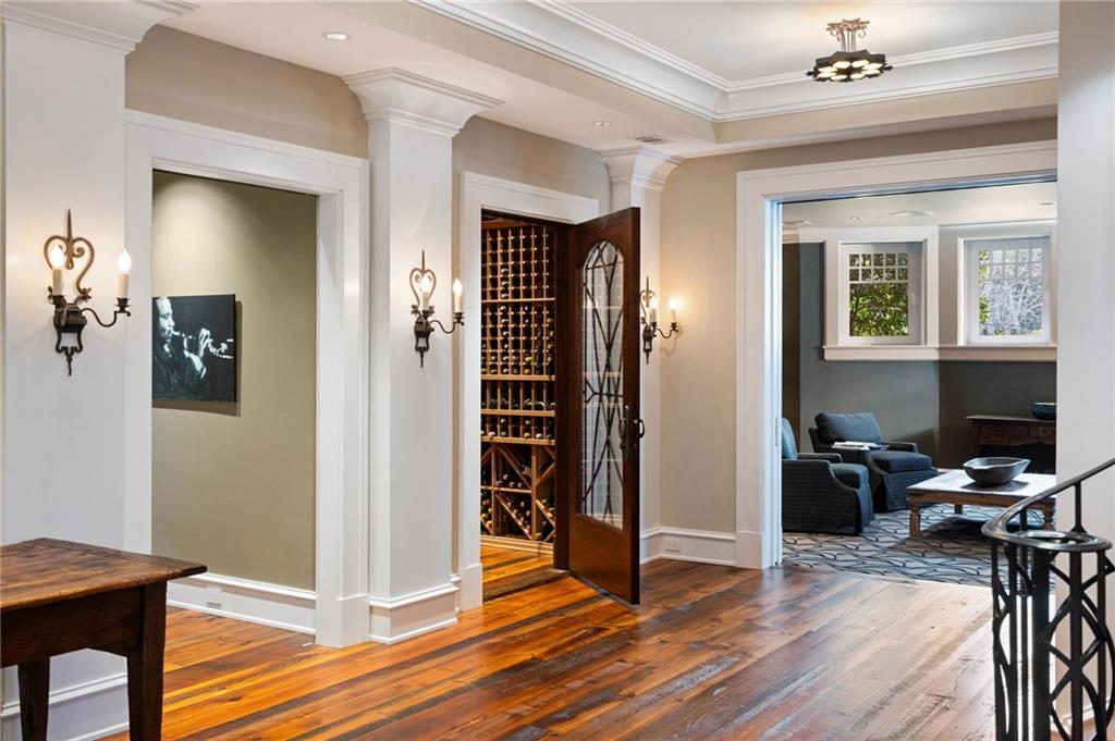 81 Peachtree Circle Northeast Atlanta, GA 30309 - Photo 38 of 54 a view of a livingroom with wooden floor and furniture