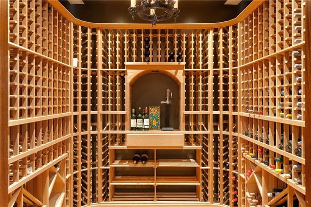 a kitchen with a refrigerator and a sink