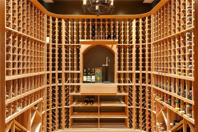 a kitchen with a refrigerator and a sink