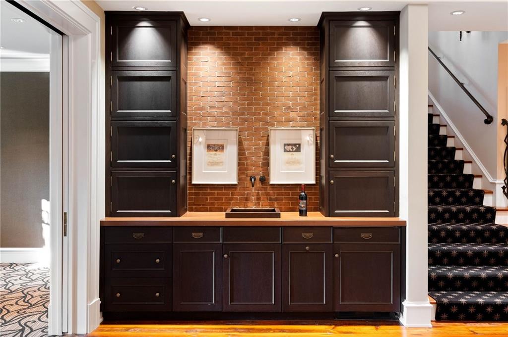 81 Peachtree Circle Northeast Atlanta, GA 30309 - Photo 40 of 54 a kitchen with a refrigerator and a sink