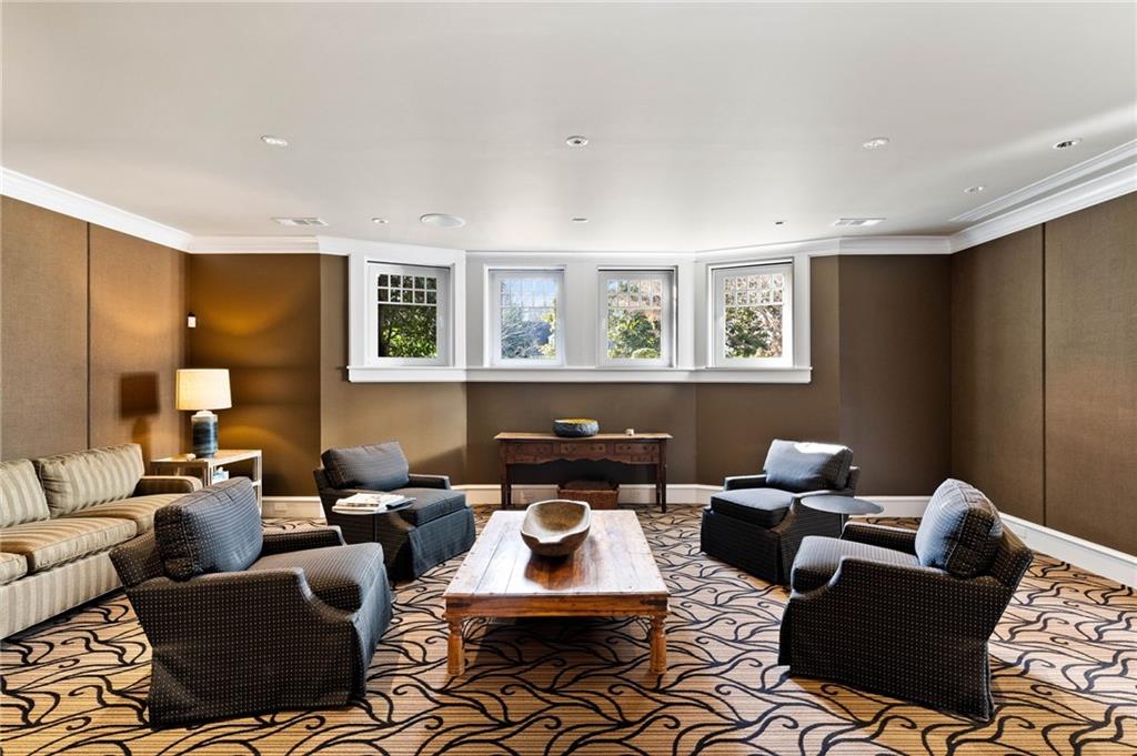 81 Peachtree Circle Northeast Atlanta, GA 30309 - Photo 41 of 54 a living room with furniture and a window