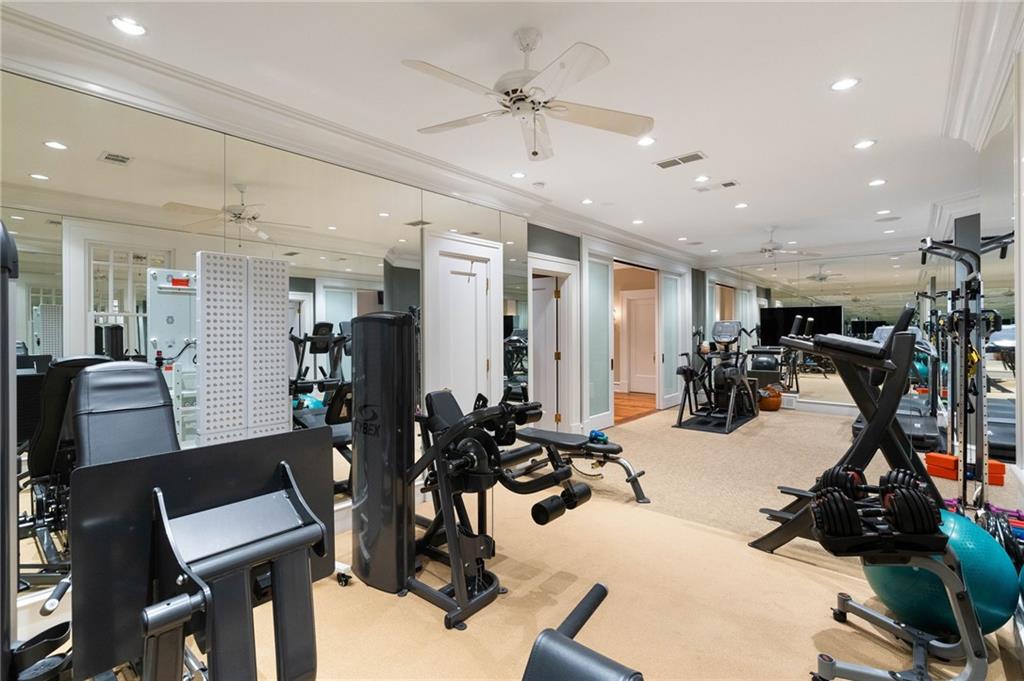 81 Peachtree Circle Northeast Atlanta, GA 30309 - Photo 43 of 54 a view of a room with gym equipment