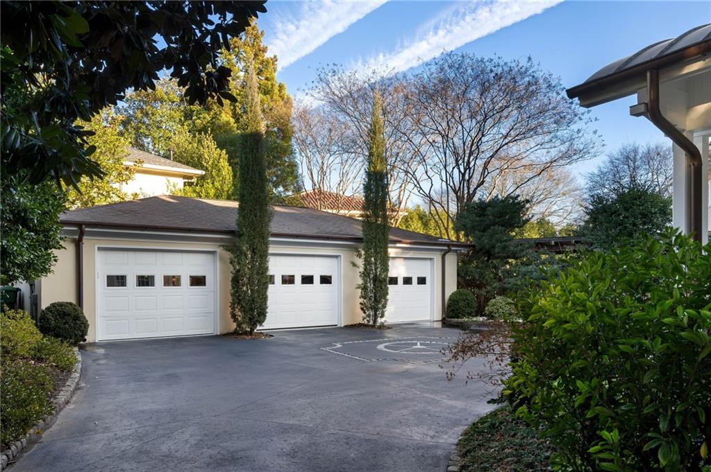 81 Peachtree Circle Northeast Atlanta, GA 30309 - Photo 45 of 54 a view of a house with a yard