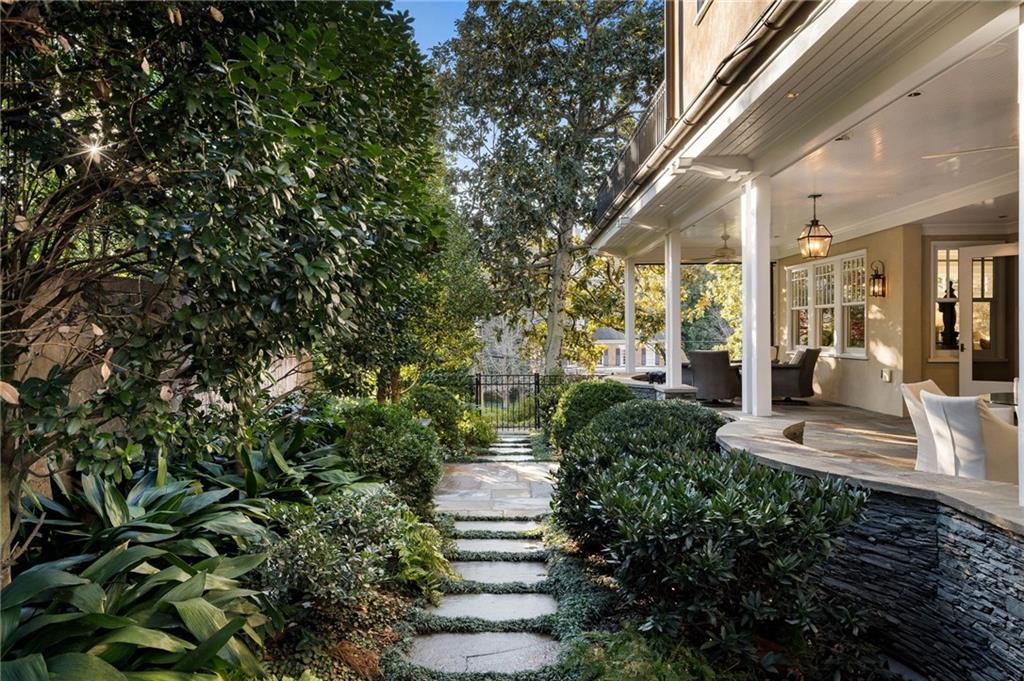 81 Peachtree Circle Northeast Atlanta, GA 30309 - Photo 46 of 54 a front view of a house with a yard