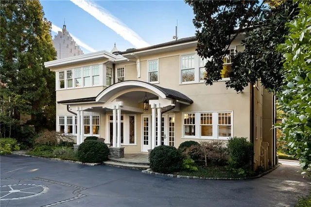 a view of city and a tall buildings