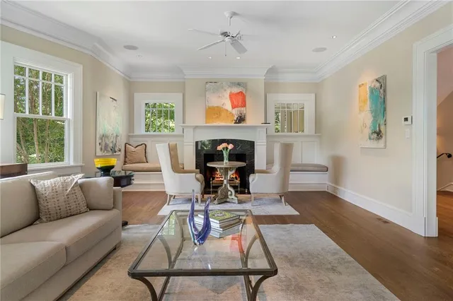 a living room with furniture or couch and a window