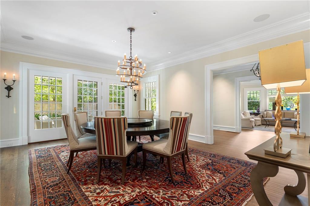 81 Peachtree Circle Northeast Atlanta, GA 30309 - Photo 9 of 54 a view of a dining room with furniture window and wooden floor