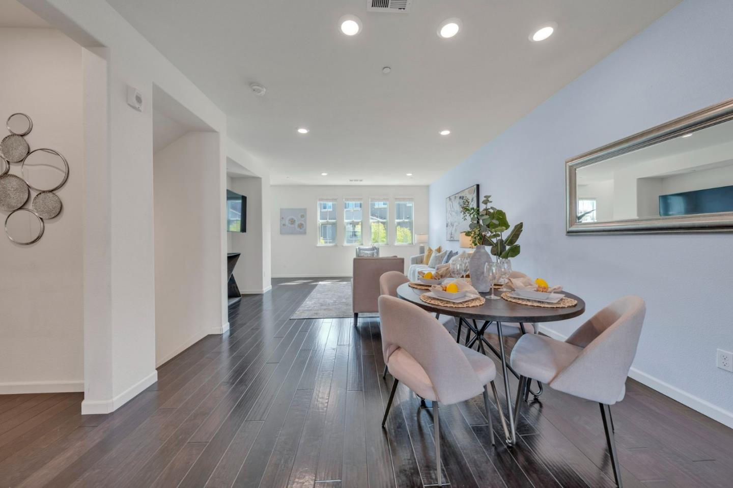103 Cypress Loop Hayward, CA 94544 - Photo 14 of 55 a view of a dining room with furniture and wooden floor