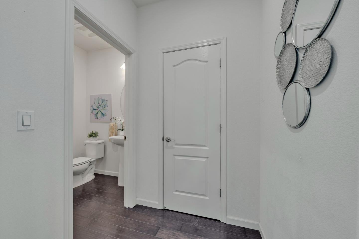 103 Cypress Loop Hayward, CA 94544 - Photo 21 of 55 a bathroom with a shower and white walls