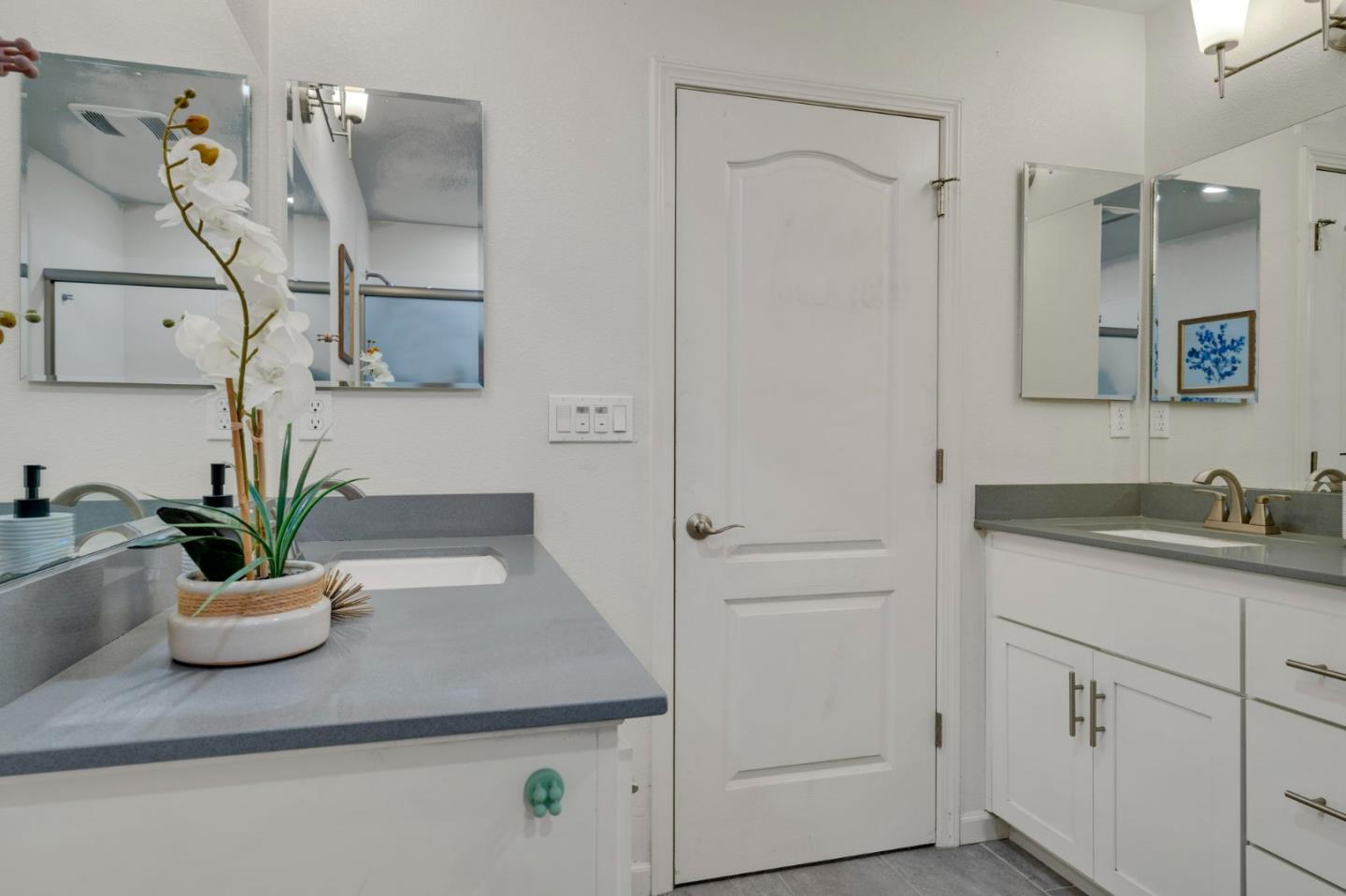 103 Cypress Loop Hayward, CA 94544 - Photo 28 of 55 a bathroom with a sink a toilet and mirror