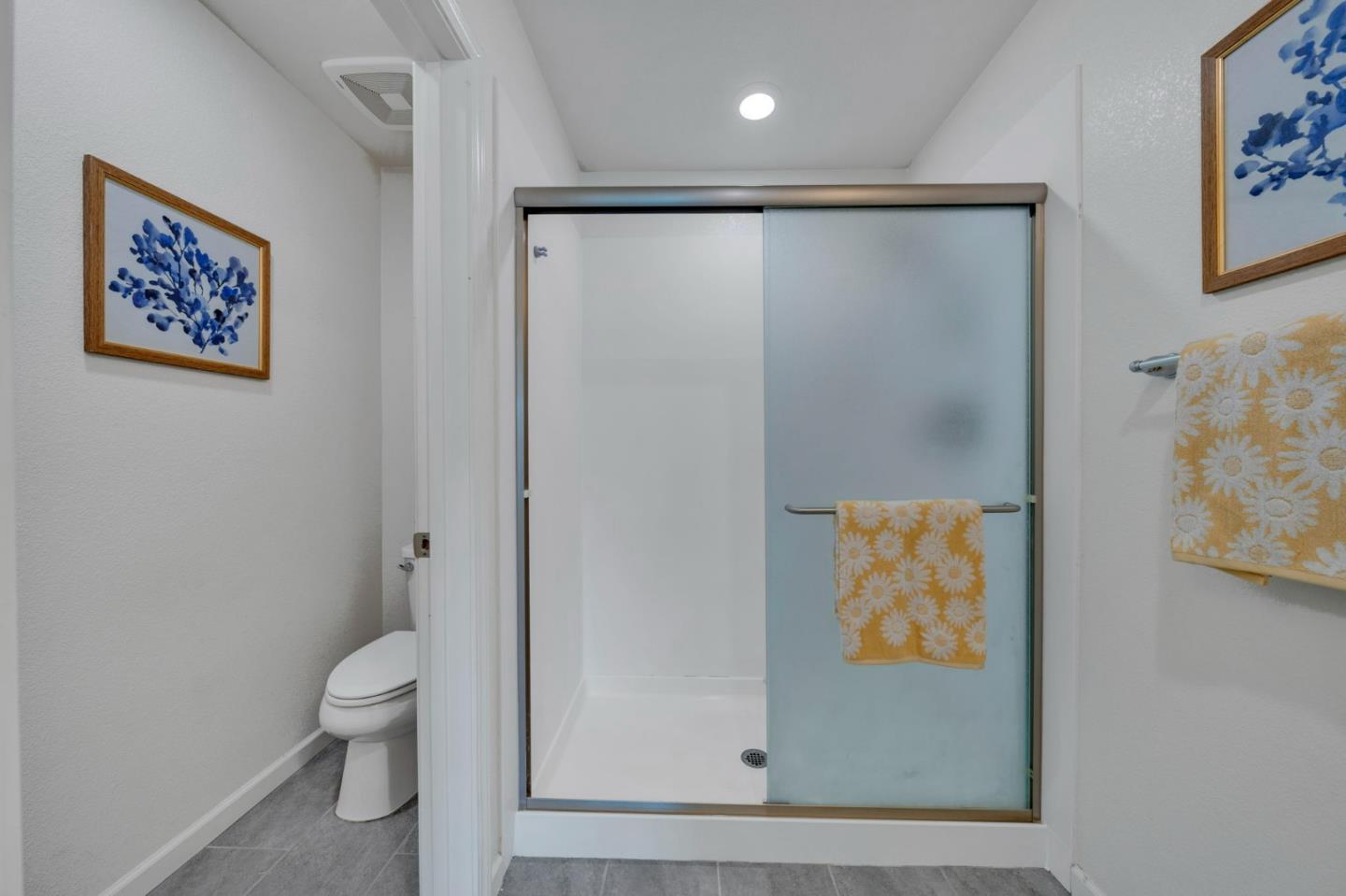 103 Cypress Loop Hayward, CA 94544 - Photo 29 of 55 a bathroom with a shower and a toilet