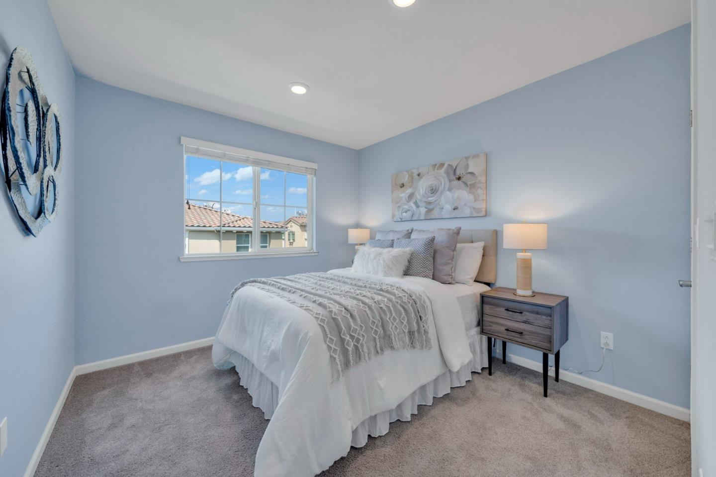 103 Cypress Loop Hayward, CA 94544 - Photo 32 of 55 a bedroom with a bed and a window