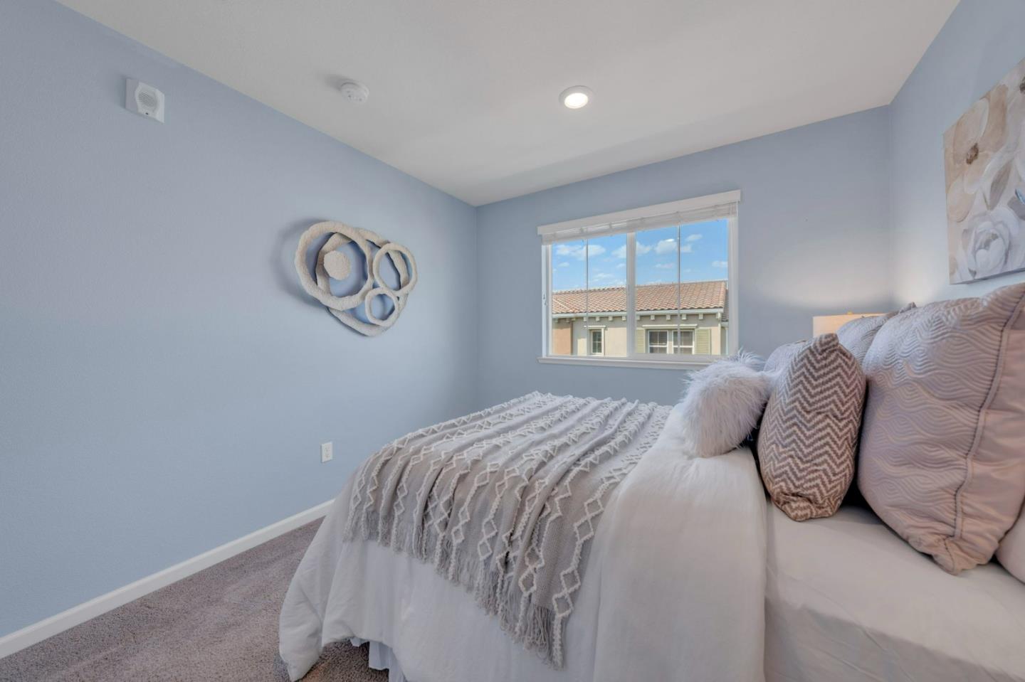 103 Cypress Loop Hayward, CA 94544 - Photo 34 of 55 a bedroom with a bed and a window