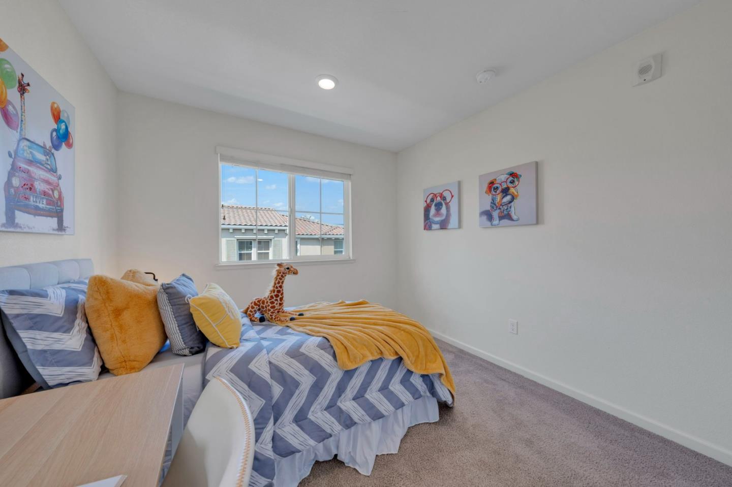 103 Cypress Loop Hayward, CA 94544 - Photo 37 of 55 a bedroom with a bed and a window