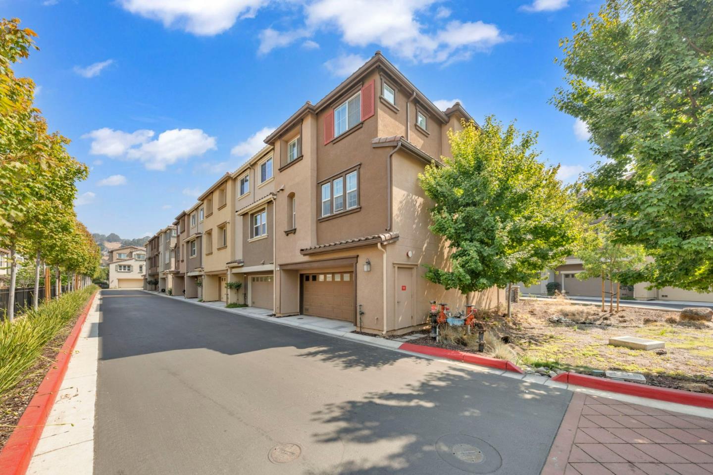 103 Cypress Loop Hayward, CA 94544 - Photo 43 of 55 a view of a street with a building in the background