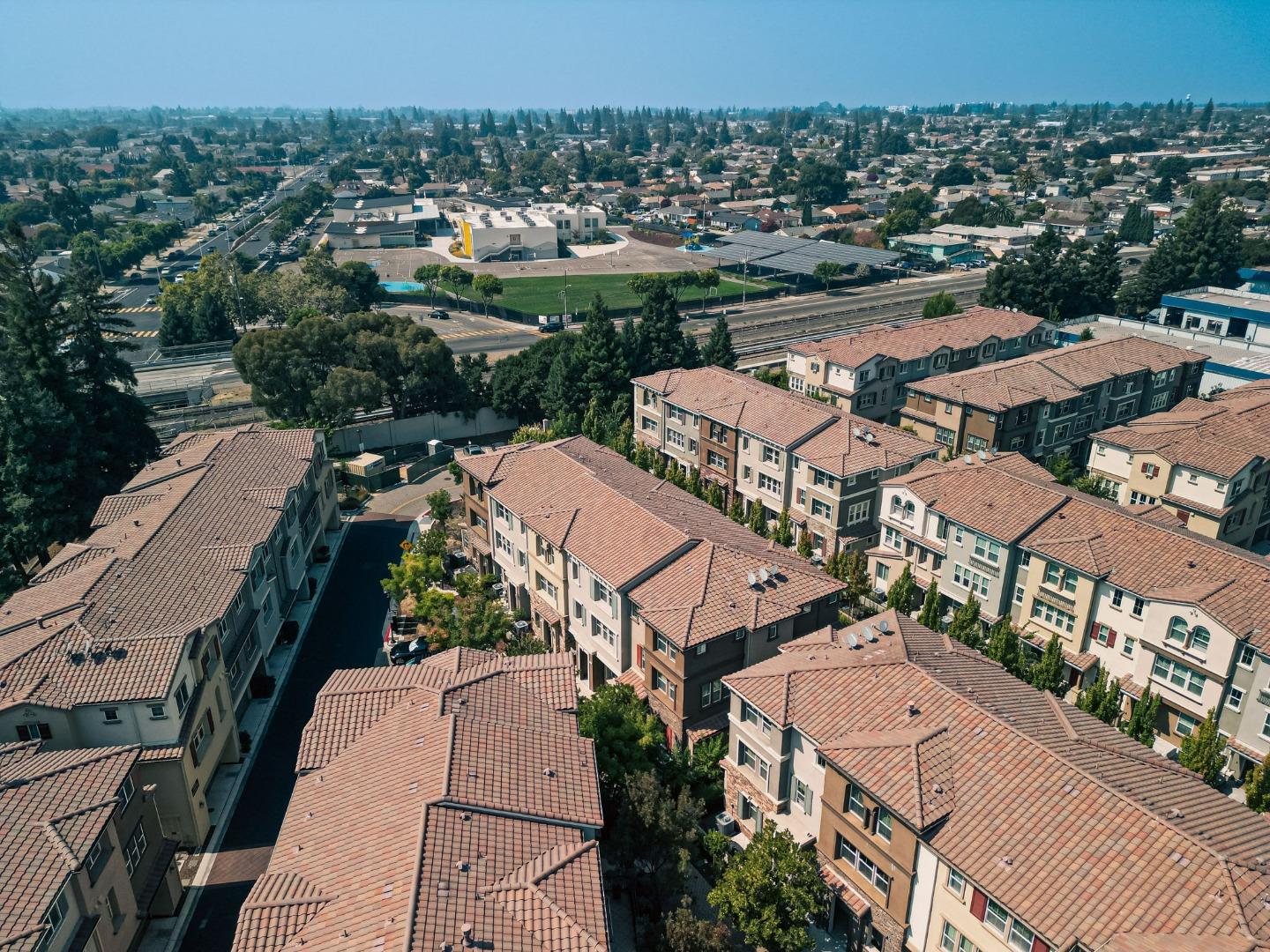 103 Cypress Loop Hayward, CA 94544 - Photo 50 of 55 an aerial view of residential houses with outdoor space