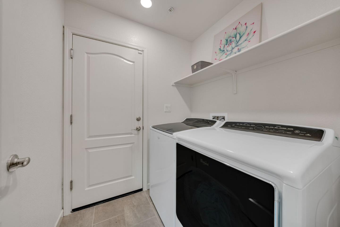 103 Cypress Loop Hayward, CA 94544 - Photo 8 of 55 a utility room with dryer and washer