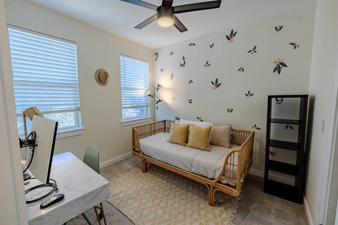 7609 Bennett Avenue, Unit A Austin, TX 78752 - Photo 11 of 20 Bedroom with carpet and a ceiling fan